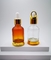 Botol penetes kaca 30ml desain baru 2023 yang dapat disesuaikan dengan braket bawah untuk minyak atsiri dan kosmetik